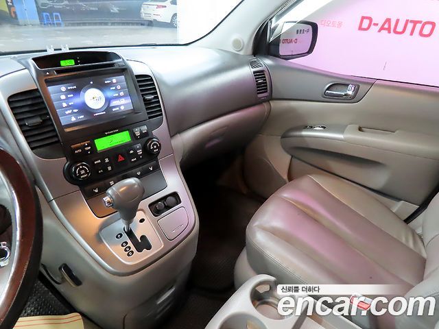 Kia Canival 2012 — photo 12