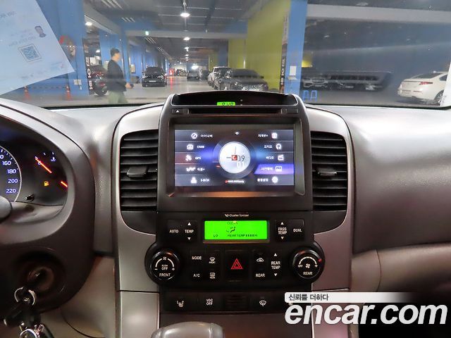 Kia Canival 2012 — photo 13
