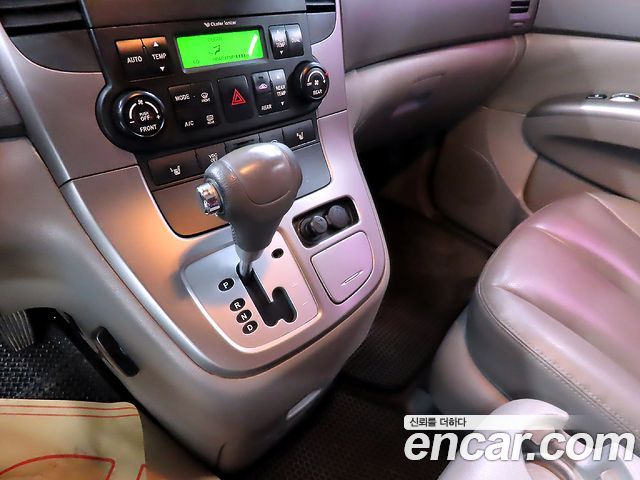 Kia Canival 2012 — photo 14