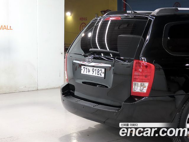 Kia Canival 2012 — photo 18