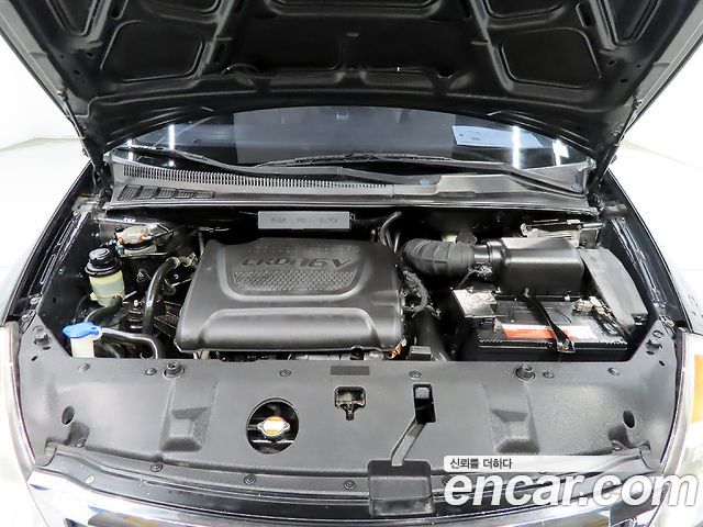 Kia Canival 2012 — photo 19