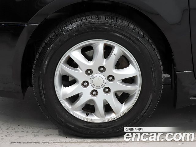 Kia Canival 2012 — photo 20