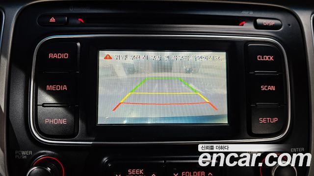 Kia Carens 2015 — photo 16