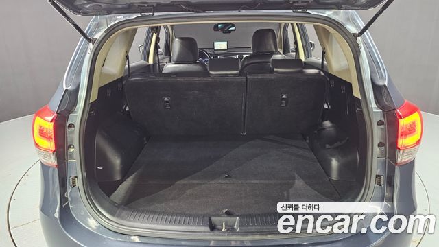 Kia Carens 2015 — photo 20