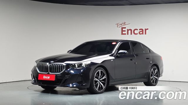 BMW 5-Series 2024 — photo 1