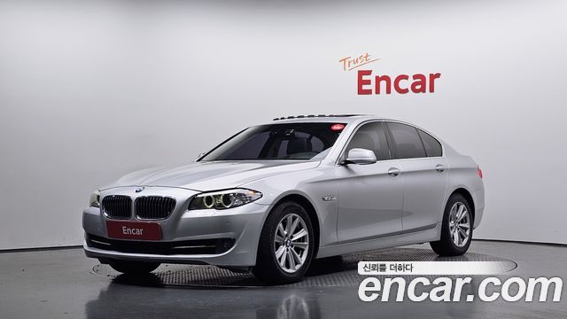 BMW 5-Series 2010 — photo 1