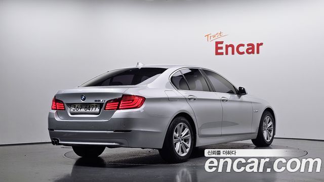 BMW 5-Series 2010 — photo 2