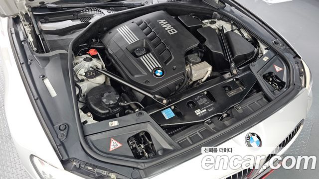 BMW 5-Series 2010 — photo 6
