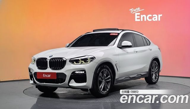 BMW X4 2021 — photo 1