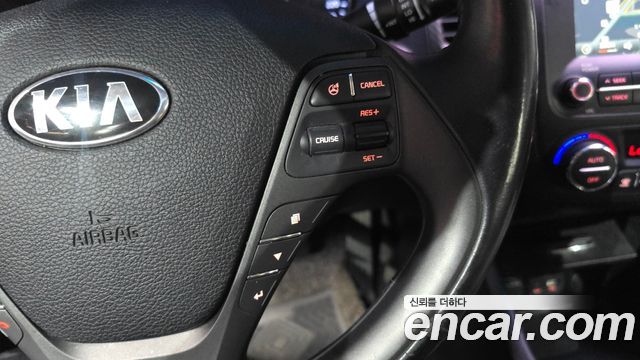 Kia K3 2015 — photo 18