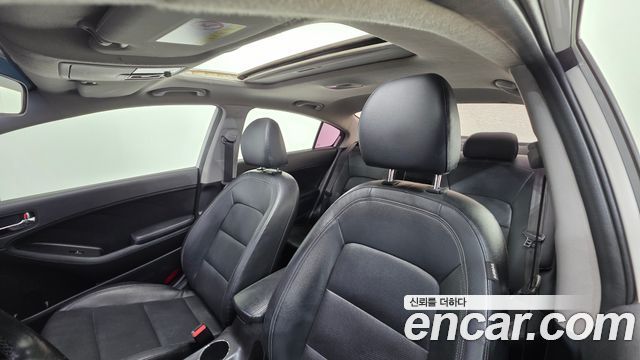 Kia K3 2015 — photo 11
