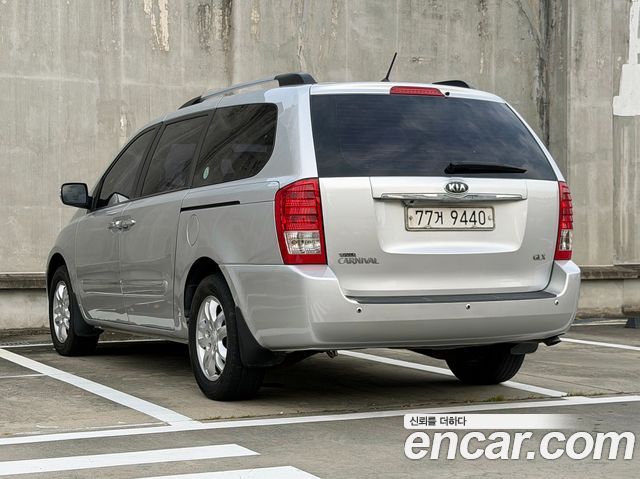 Kia Canival 2012 — photo 4