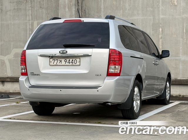Kia Canival 2012 — photo 6