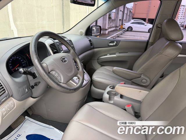 Kia Canival 2012 — photo 10