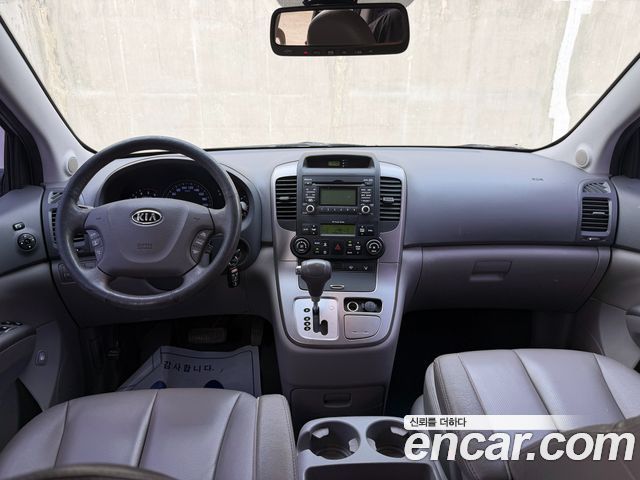 Kia Canival 2012 — photo 12