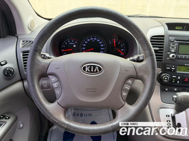 Kia Canival 2012 — photo 13