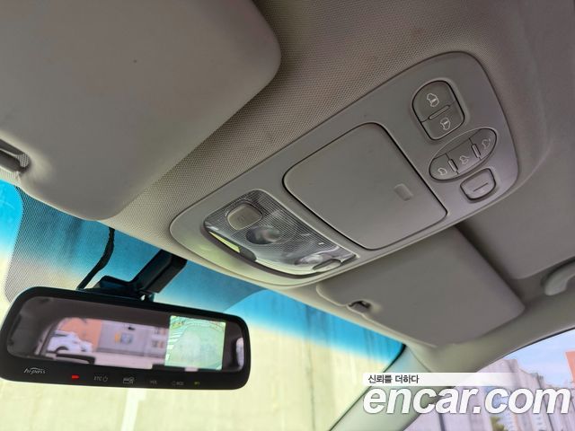 Kia Canival 2012 — photo 15