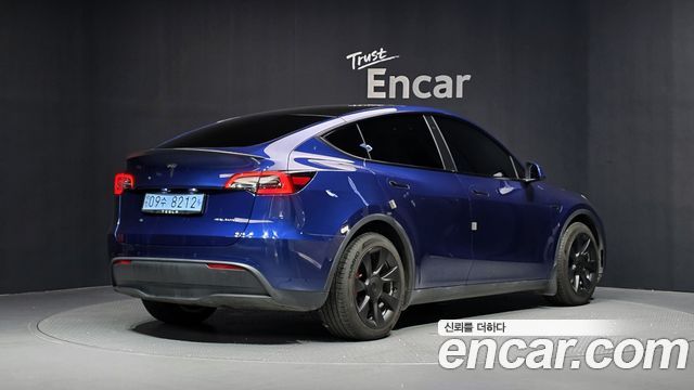 Tesla Model Y 2022 — photo 2