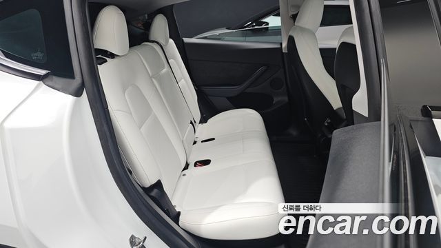 Tesla Model Y 2023 — photo 17