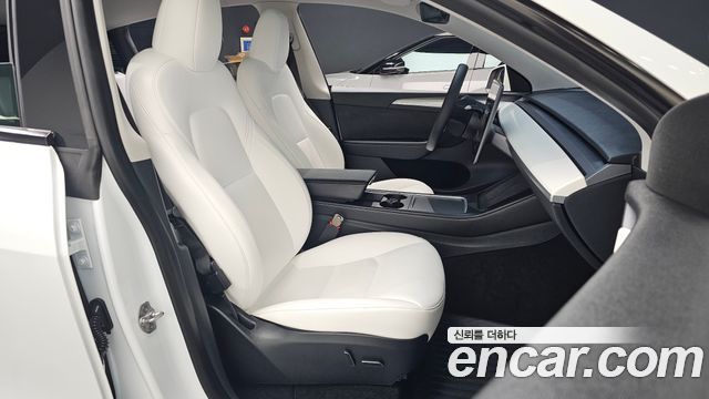 Tesla Model Y 2023 — photo 16