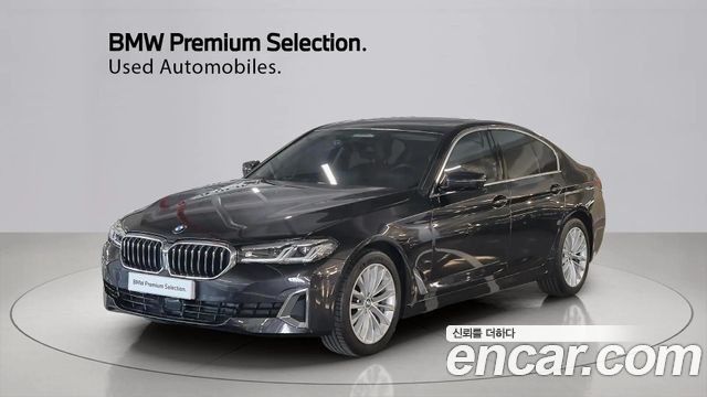 BMW 5-Series 2023 — photo 1