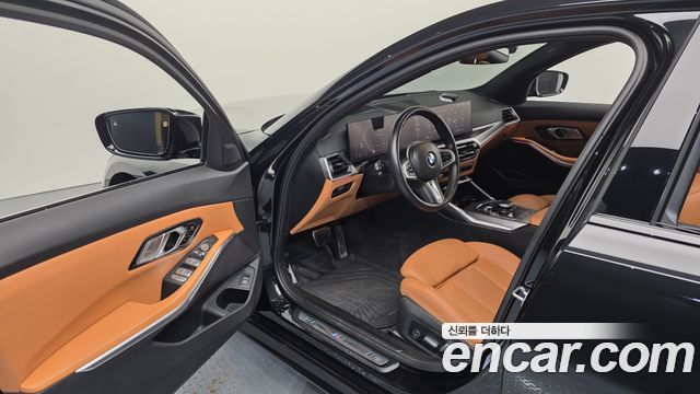 BMW 3-Series 2023 — photo 13