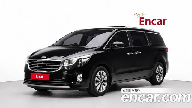 Kia Canival 2015 — photo 1