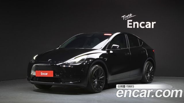 Tesla Model Y 2024 — photo 31