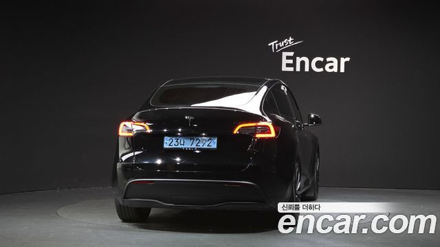 Tesla Model Y 2024 — photo 4