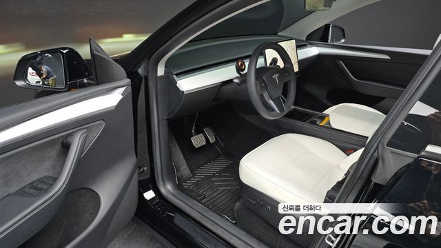 Tesla Model Y 2024 — photo 13