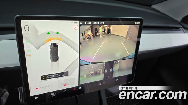 Tesla Model Y 2024 — photo 20