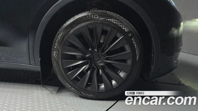 Tesla Model Y 2024 — photo 7