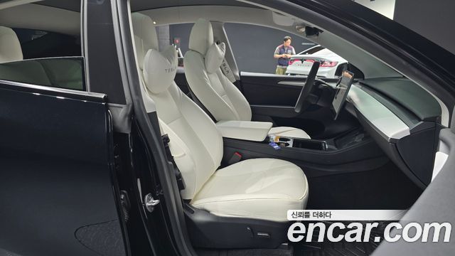 Tesla Model Y 2024 — photo 16