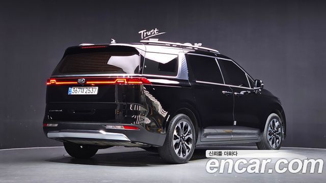 Kia Canival 2021 — photo 2