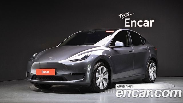Tesla Model Y 2024 — photo 31