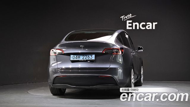 Tesla Model Y 2024 — photo 4