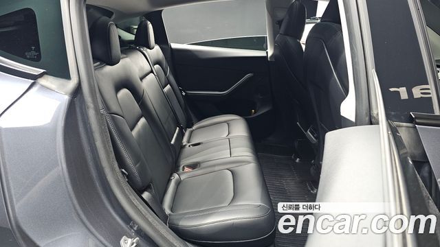 Tesla Model Y 2024 — photo 17