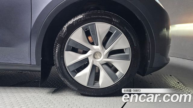 Tesla Model Y 2024 — photo 7