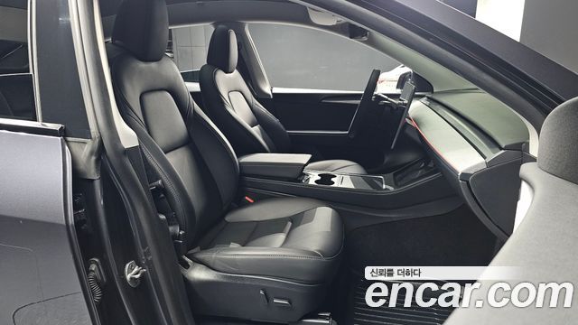 Tesla Model Y 2024 — photo 16