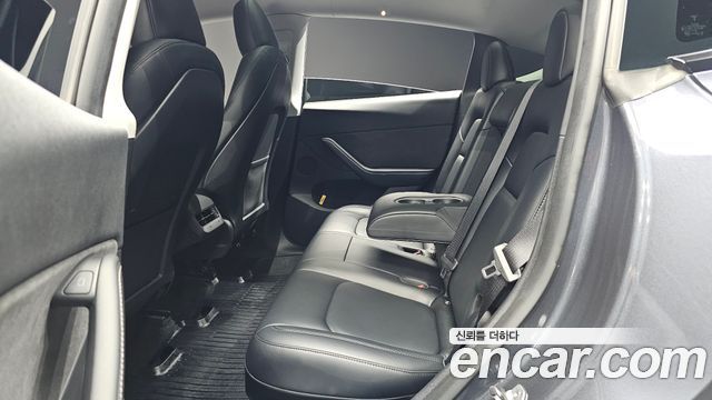 Tesla Model Y 2024 — photo 28