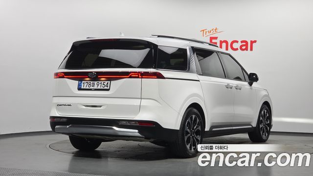 Kia Canival 2021 — photo 2