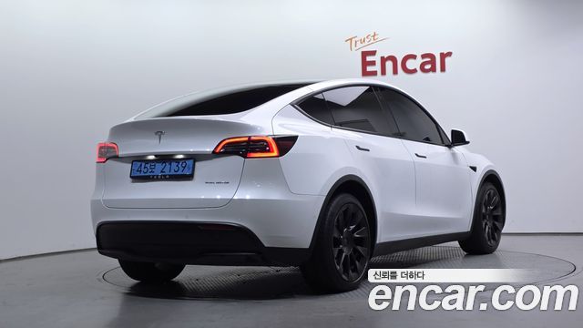 Tesla Model Y 2022 — photo 2