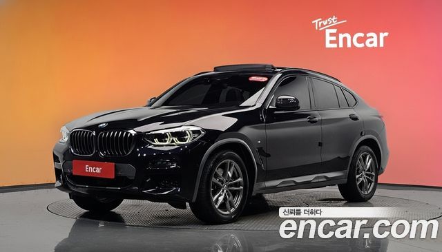 BMW X4 2021 — photo 1