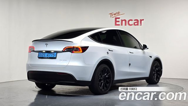 Tesla Model Y 2022 — photo 2