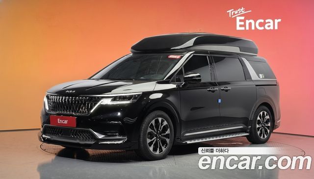 Kia Canival 2023 — photo 1