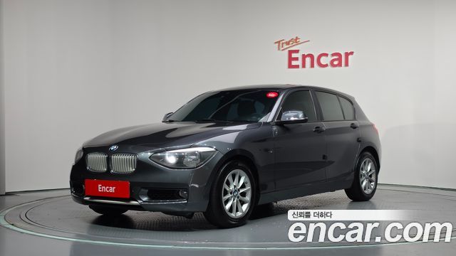 BMW 1-Series 2014 — photo 1