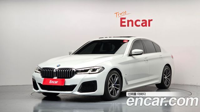 BMW 5-Series 2023 — photo 1