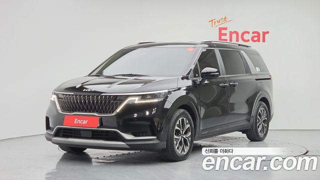 Kia Canival 2023 — photo 1