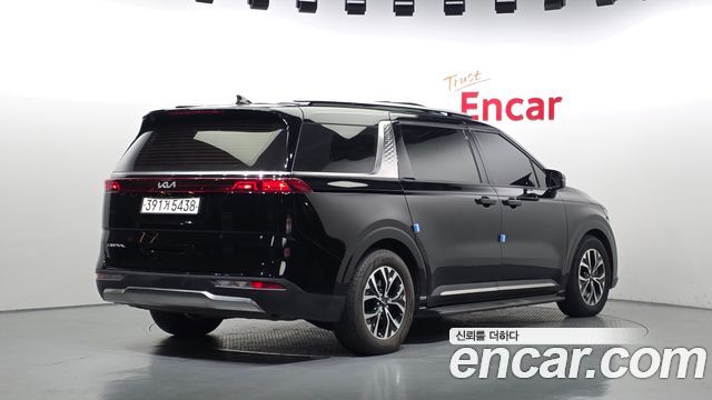 Kia Canival 2022 — photo 2