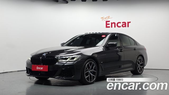 BMW 5-Series 2023 — photo 1